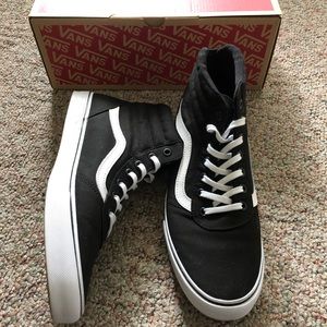 Black and white Sk8-Hi Vans